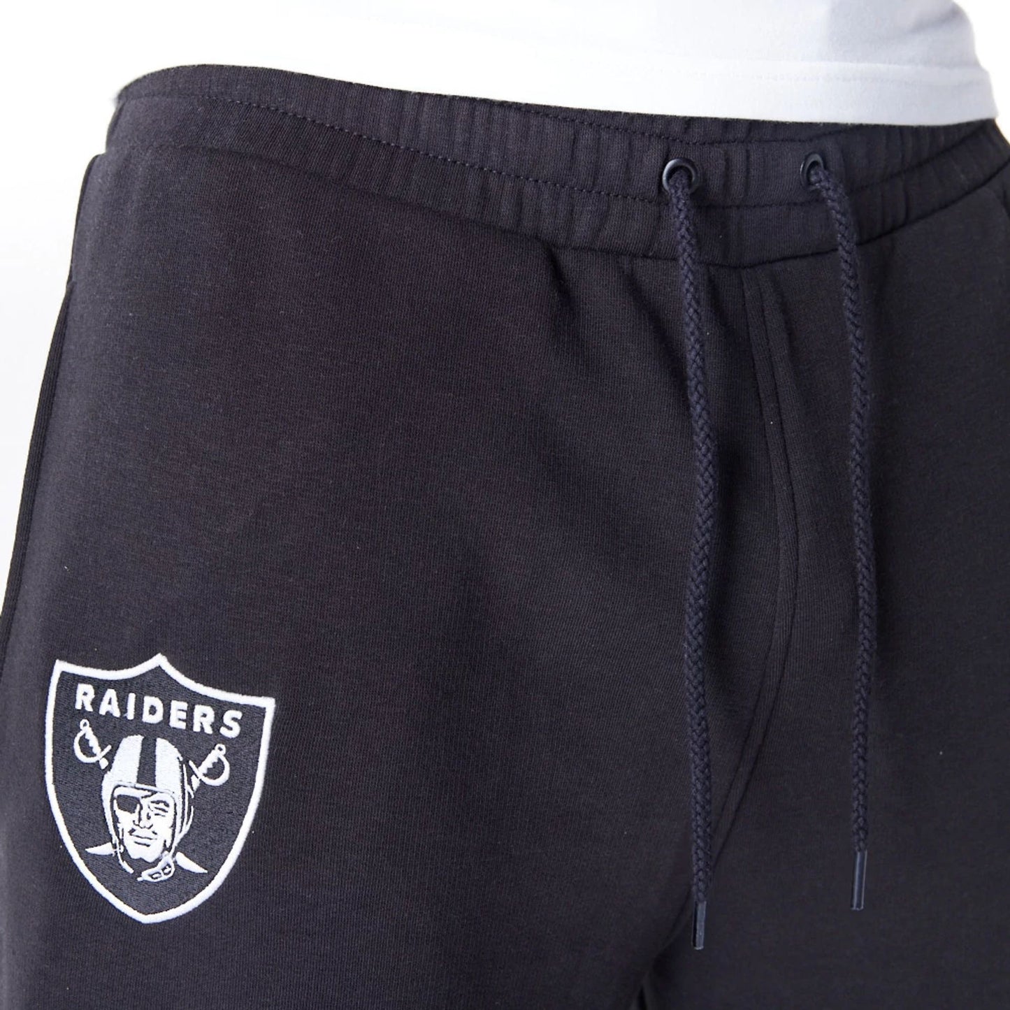 The Male model is wearing Las Vegas Raiders NFL League Essential Black Track Joggers  2