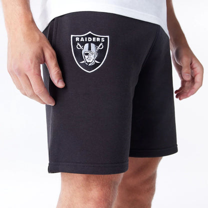 The Male model is wearing Las Vegas Raiders NFL League Essential Black Shorts  3