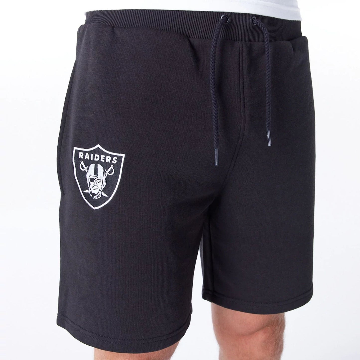 The Male model is wearing Las Vegas Raiders NFL League Essential Black Shorts  1