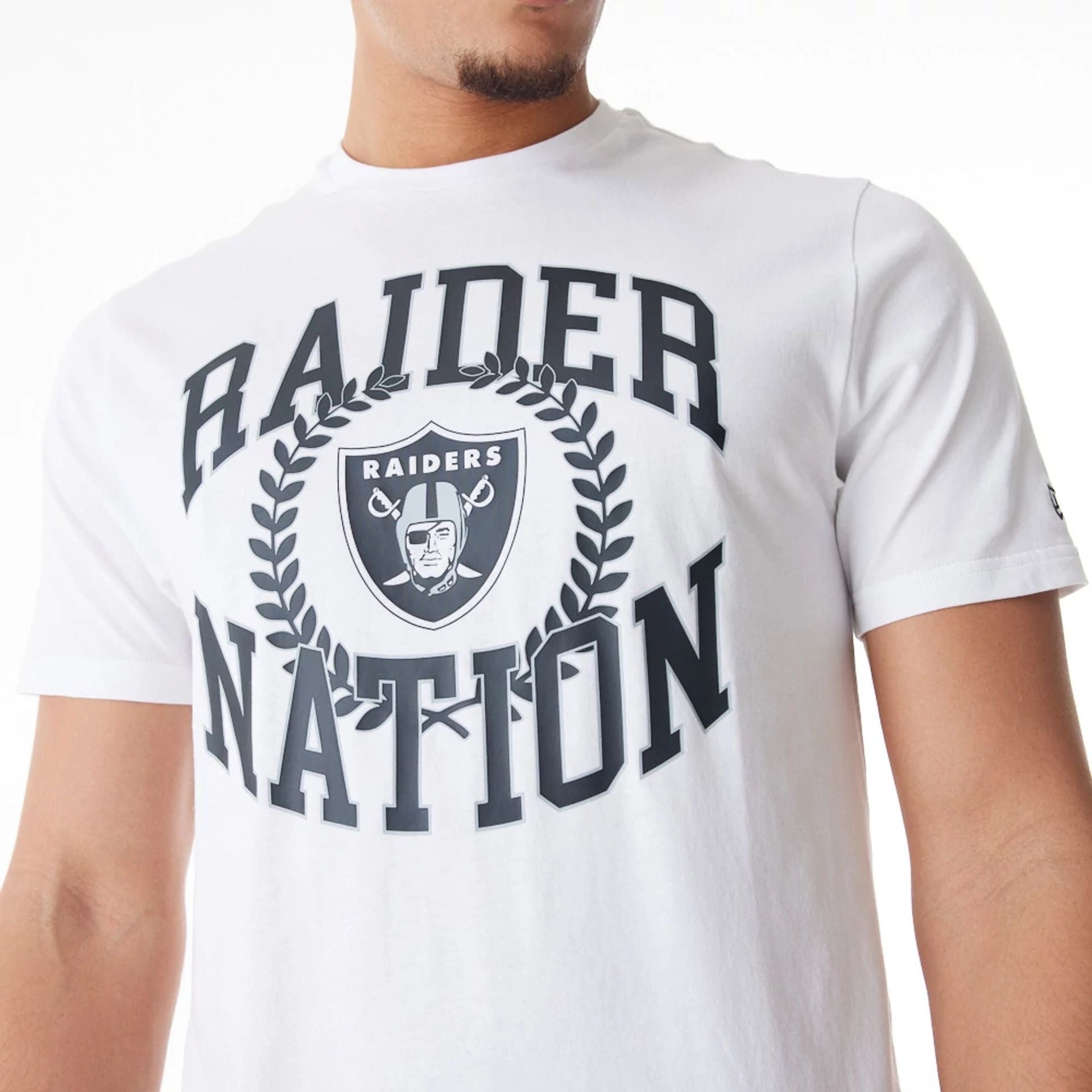 The Male model is wearing Las Vegas Raiders NFL Laurel Graphic White T-Shirt 2