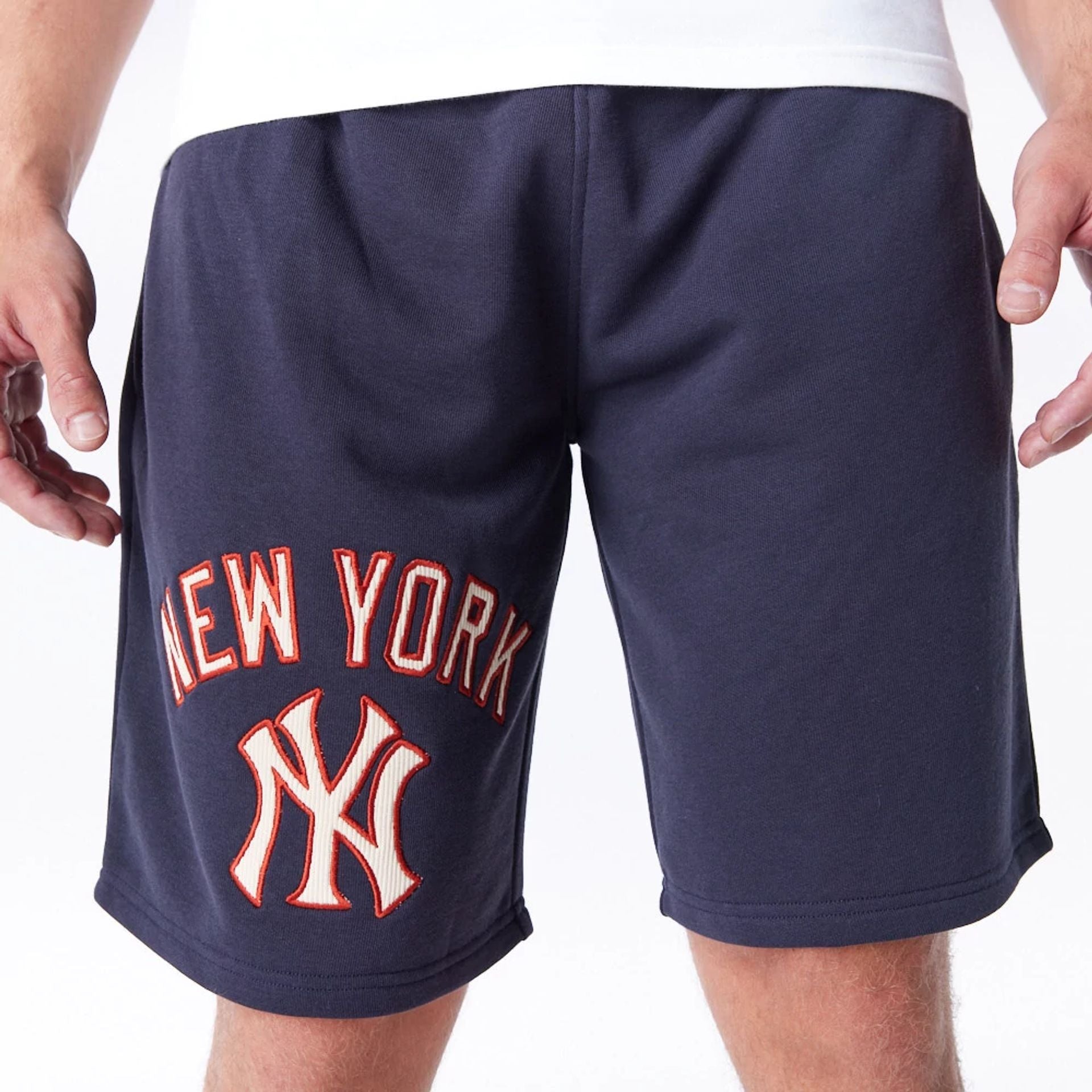 The Male model is wearing New York Yankees MLB Lifestyle Navy Shorts  1