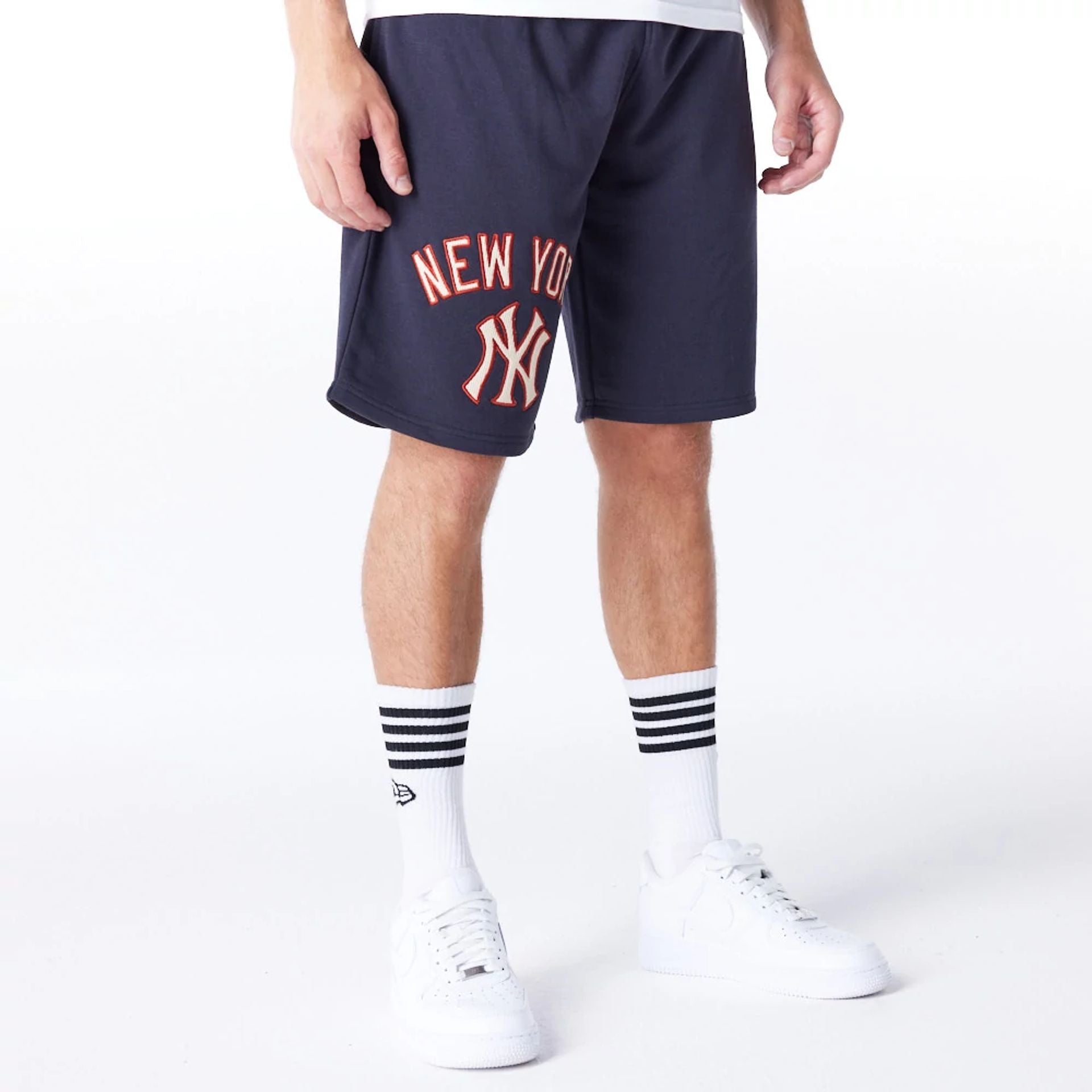 The Male model is wearing New York Yankees MLB Lifestyle Navy Shorts  5