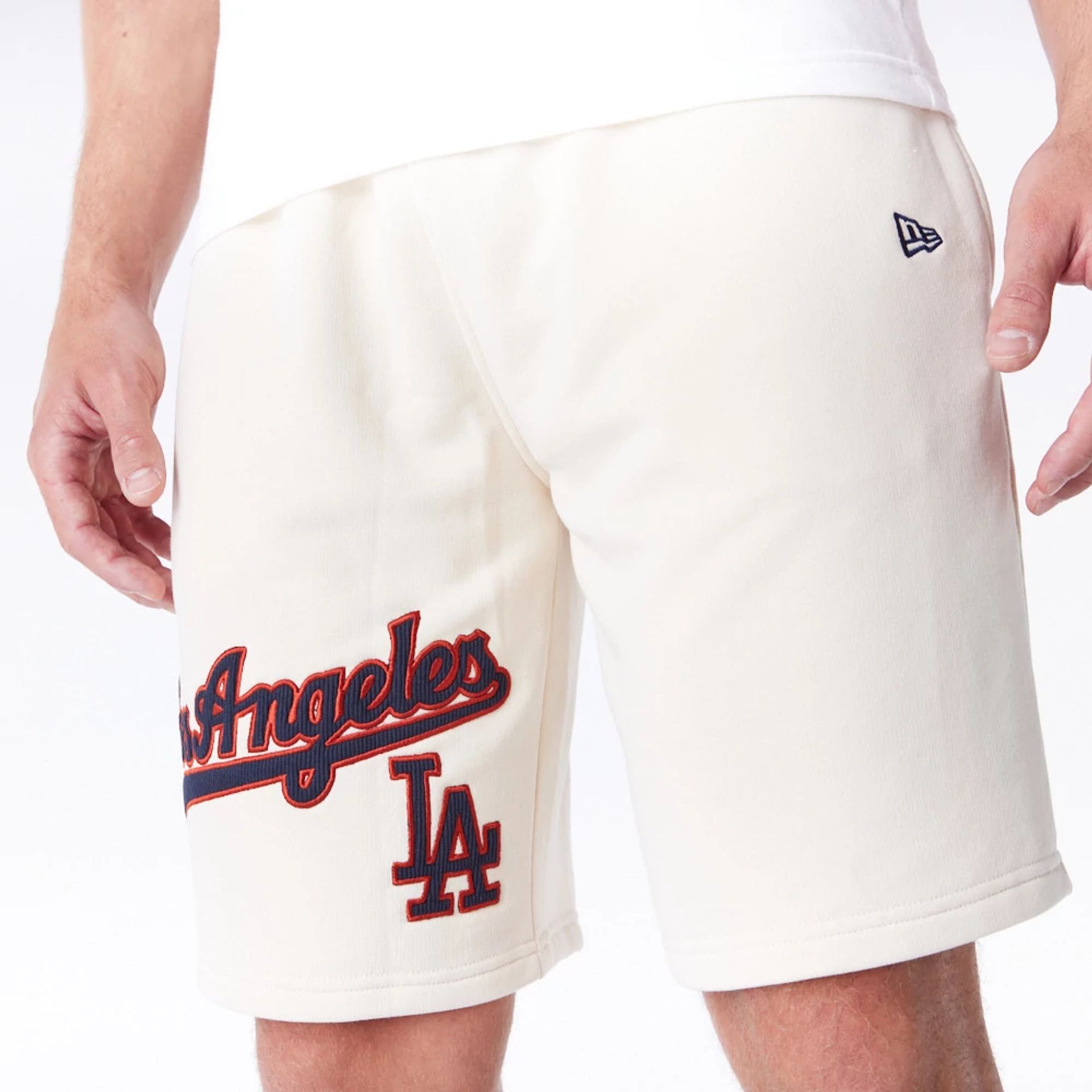 The Male model is wearing LA Dodgers MLB Lifestyle Light Beige Shorts  1