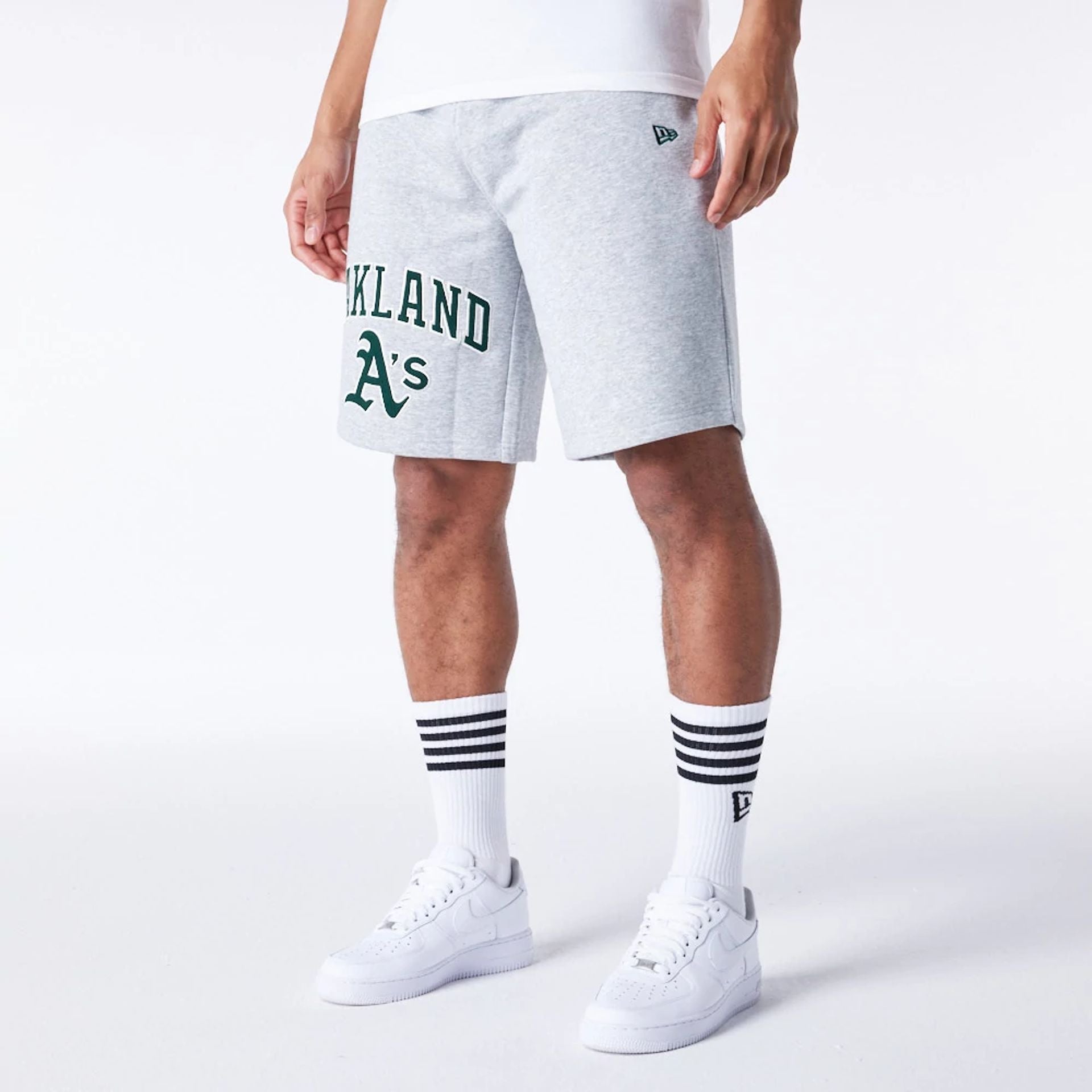 The Male model is wearing Oakland Athletics MLB Lifestyle Grey Shorts  7