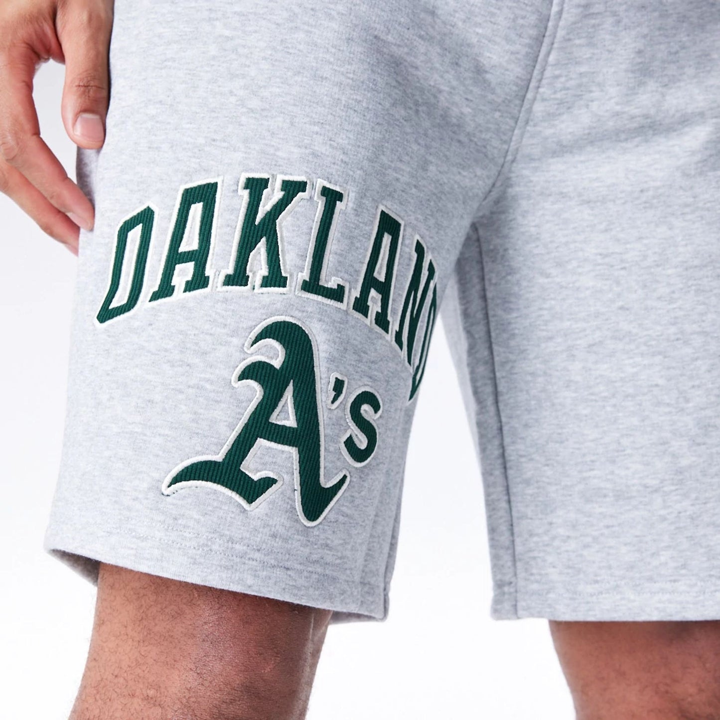 The Male model is wearing Oakland Athletics MLB Lifestyle Grey Shorts  8