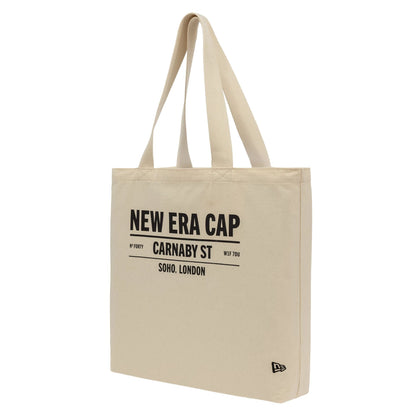 This is a New Era Cap Carnaby Address Light Beige Canvas Tote Bag 1