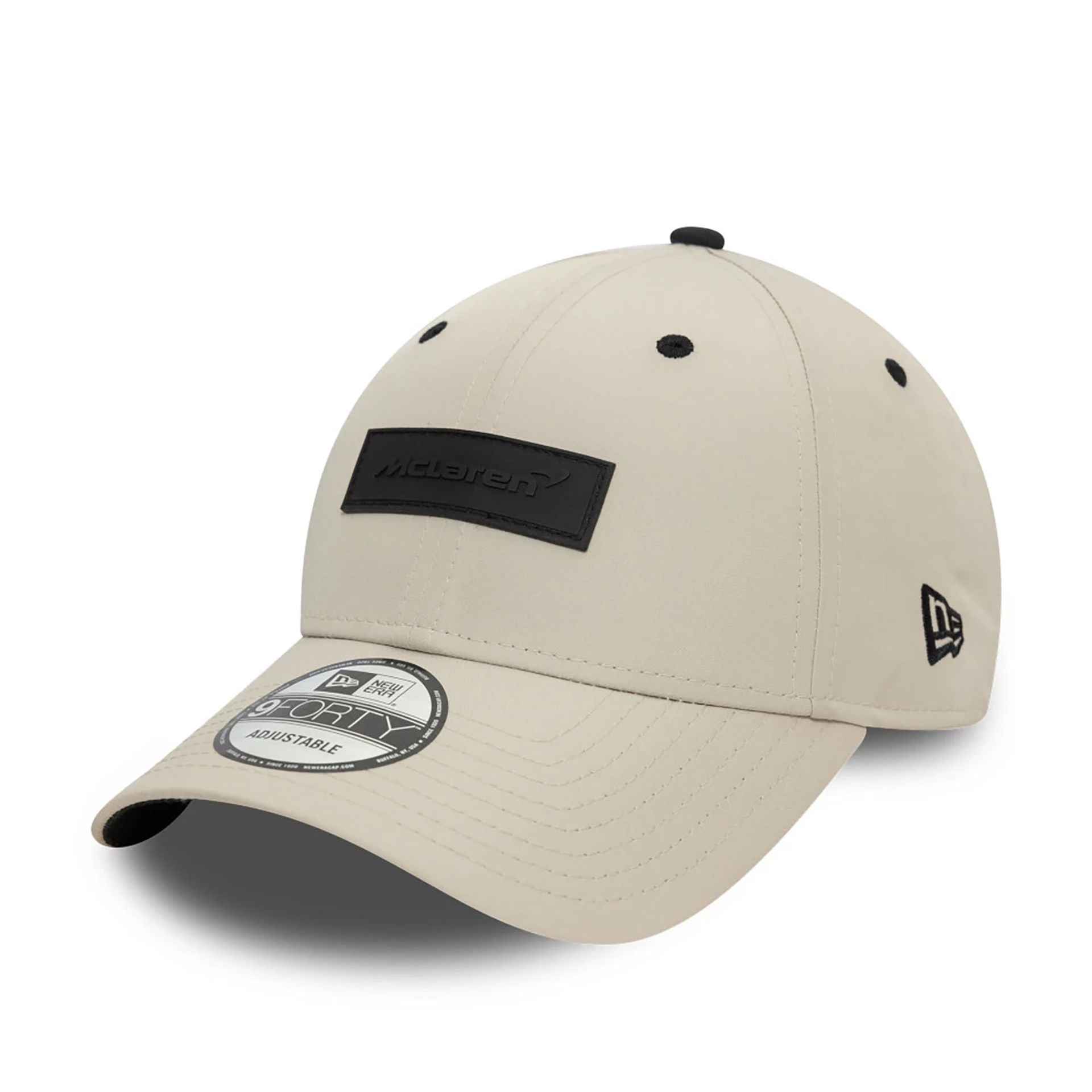 This is a McLaren Automotive Motorsports Light Beige 9FORTY Adjustable Cap 1