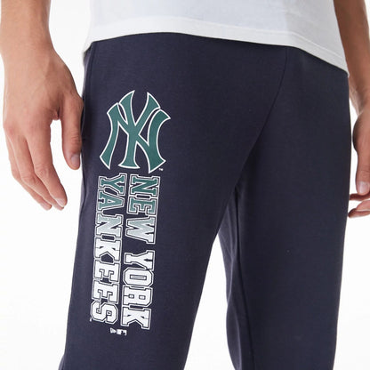 The Male model is wearing New York Yankees MLB Gradient Graphic Navy Joggers  7