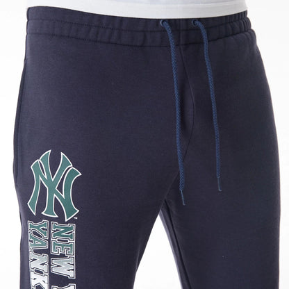 The Male model is wearing New York Yankees MLB Gradient Graphic Navy Joggers  3