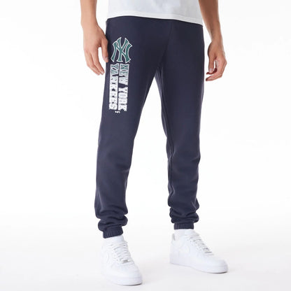 The Male model is wearing New York Yankees MLB Gradient Graphic Navy Joggers  1