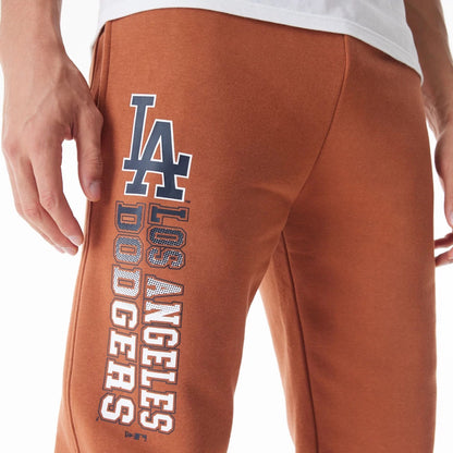 The Male model is wearing LA Dodgers MLB Gradient Graphic Brown Joggers  8