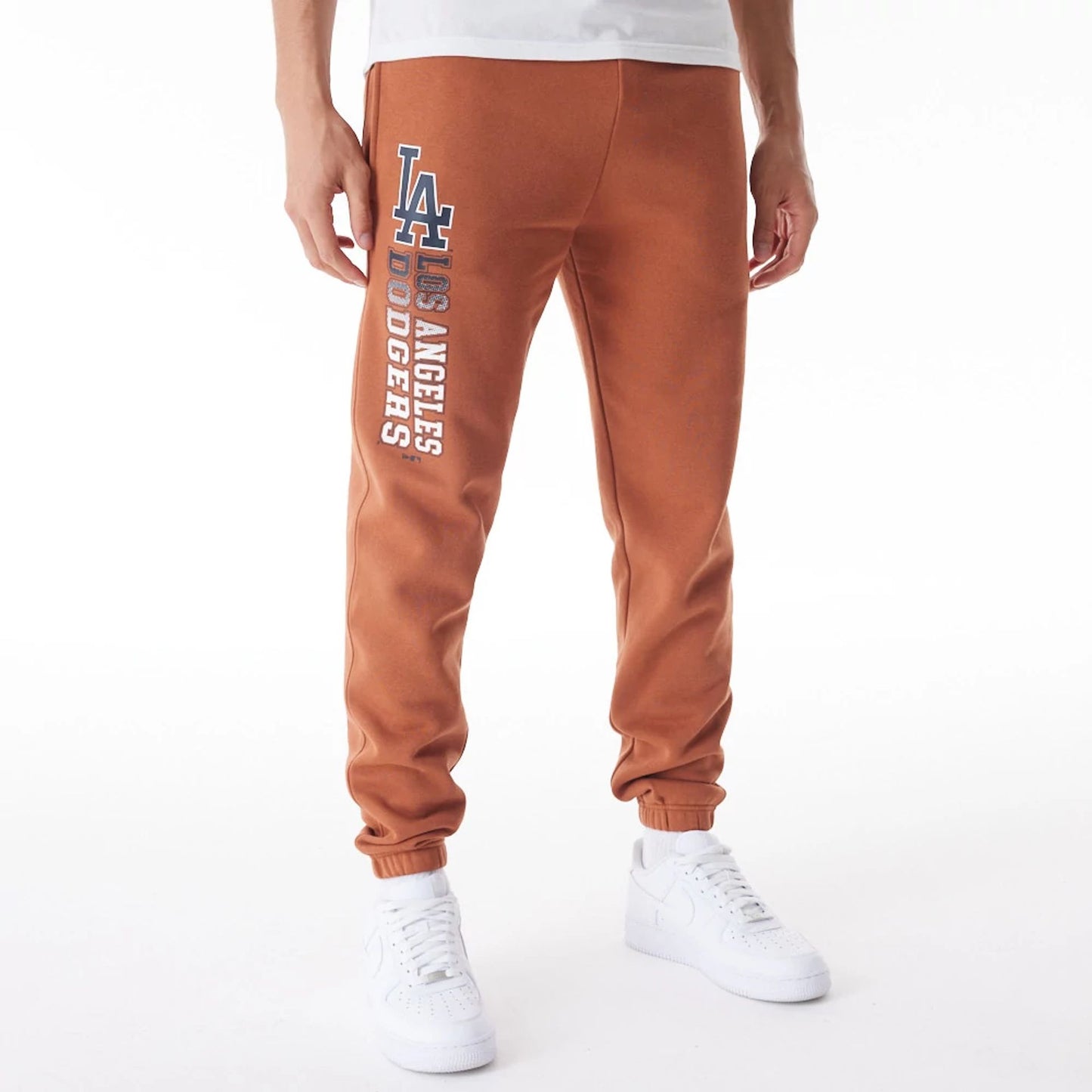 The Male model is wearing LA Dodgers MLB Gradient Graphic Brown Joggers  1