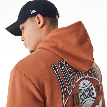 The Male model is wearing LA Dodgers MLB Gradient Brown Oversized Pullover Hoodie  8