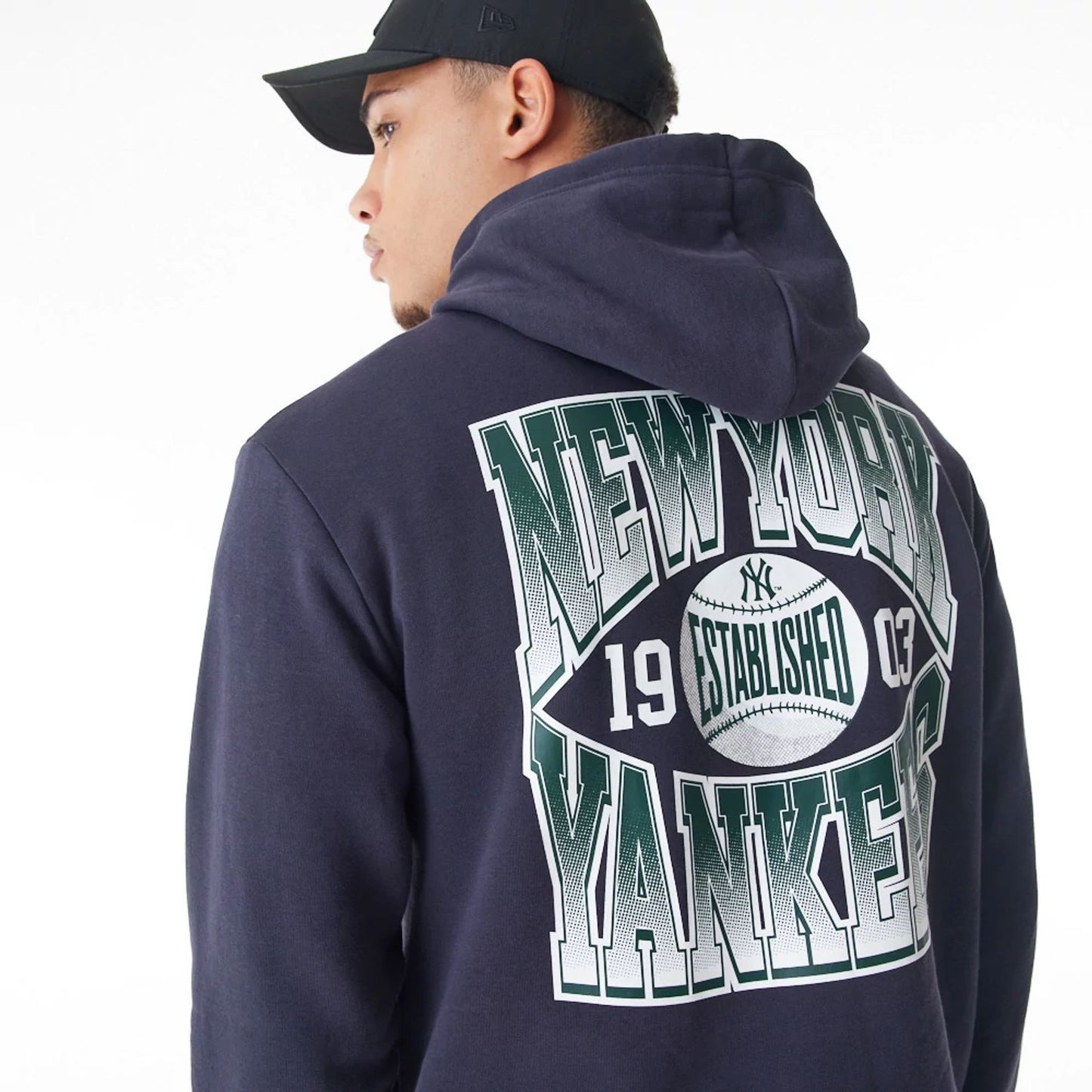 The Male model is wearing New York Yankees MLB Gradient Navy Oversized Pullover Hoodie  4