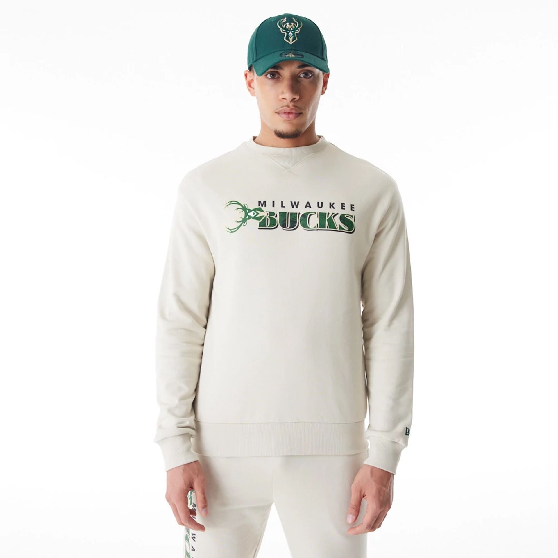 The Male model is wearing Milwaukee Bucks NBA Graphic Cream Crew Neck Sweater  1