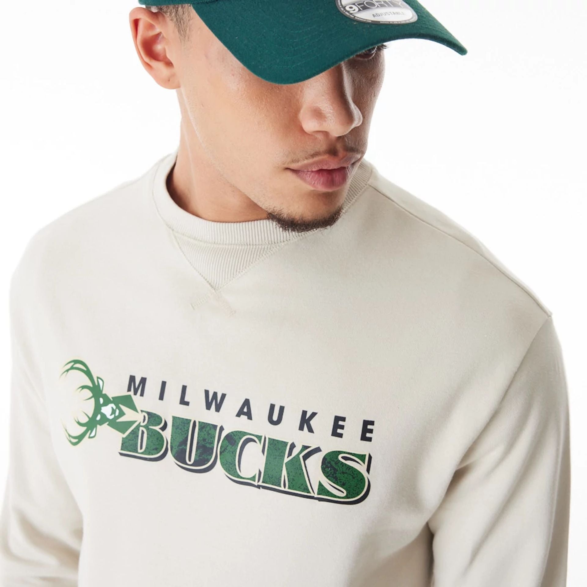 The Male model is wearing Milwaukee Bucks NBA Graphic Cream Crew Neck Sweater  7