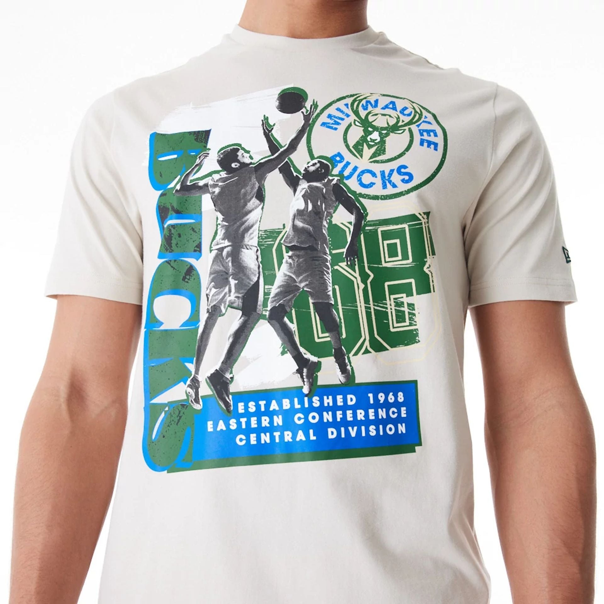 The Male model is wearing Milwaukee Bucks NBA Player Graphic Cream T-Shirt  7