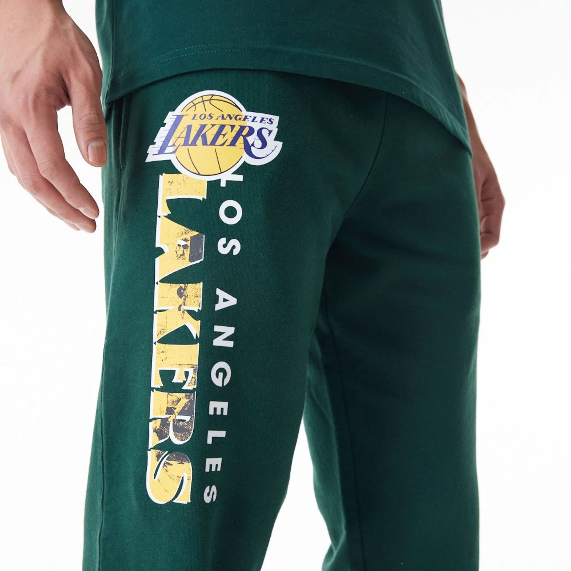 The Male model is wearing LA Lakers NBA Graphic Dark Green Joggers  2