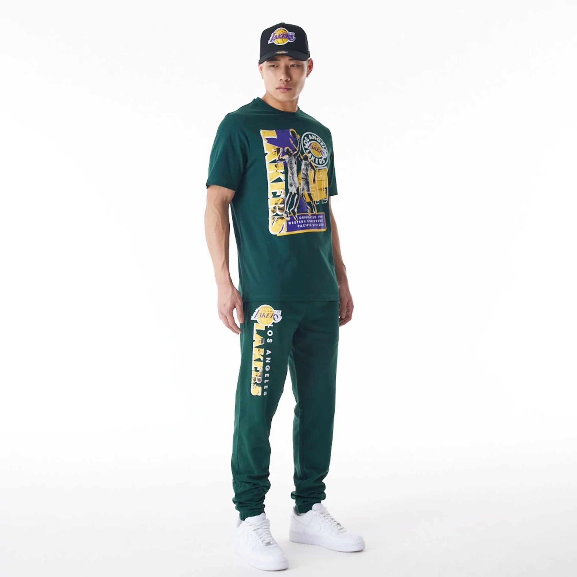 The Male model is wearing LA Lakers NBA Graphic Dark Green Joggers  4