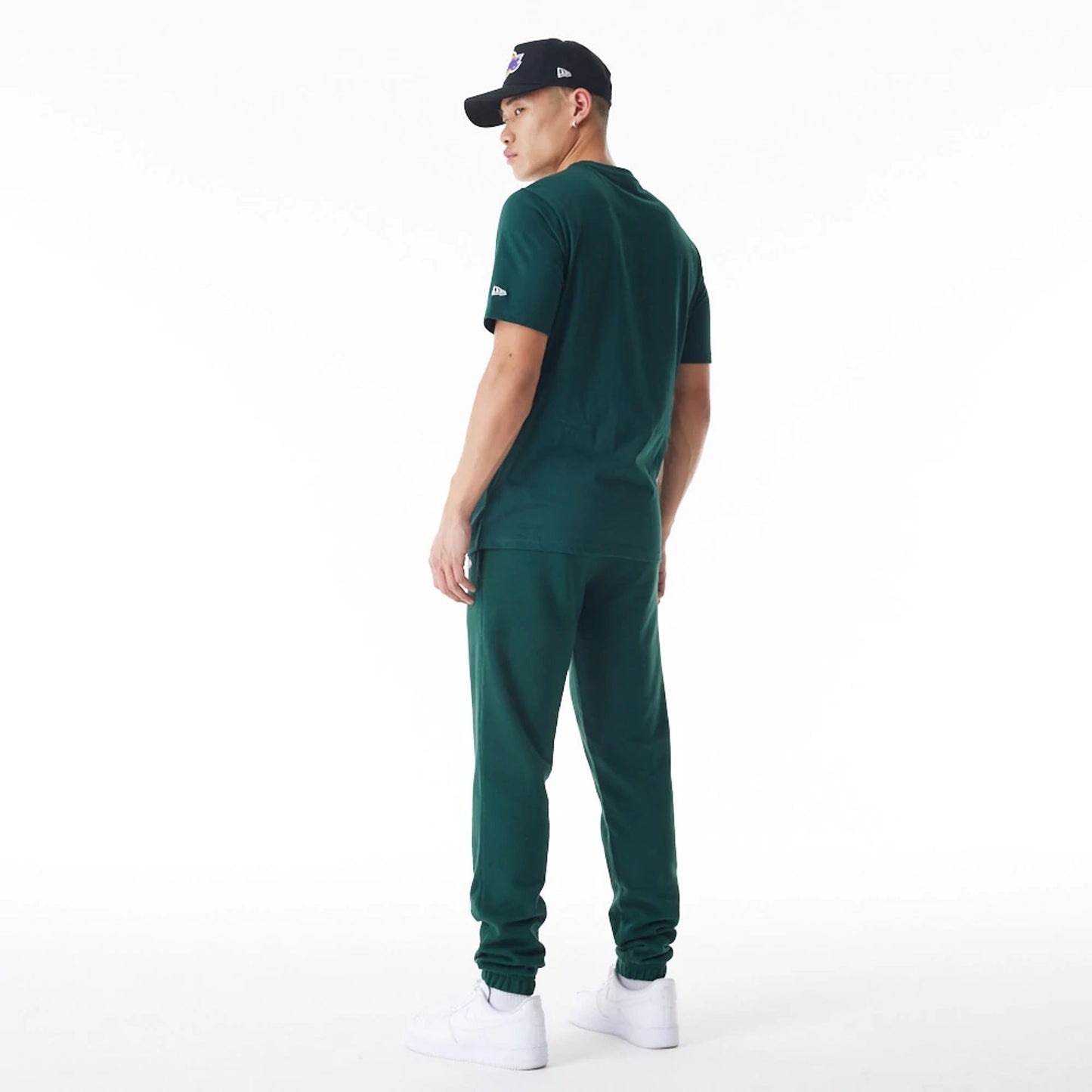 The Male model is wearing LA Lakers NBA Graphic Dark Green Joggers  6