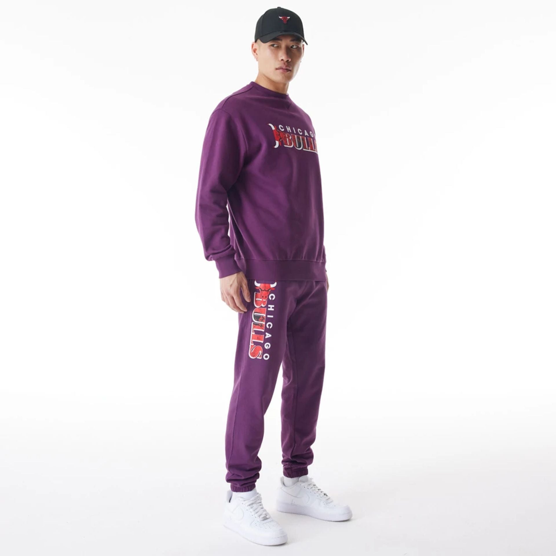 The Male model is wearing Chicago Bulls NBA Graphic Dark Purple Joggers  4