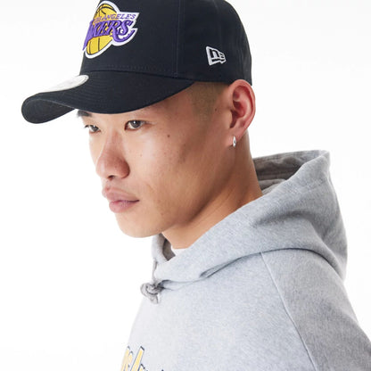 The Male model is wearing LA Lakers NBA Flame Print Grey Oversized Pullover Hoodie  4