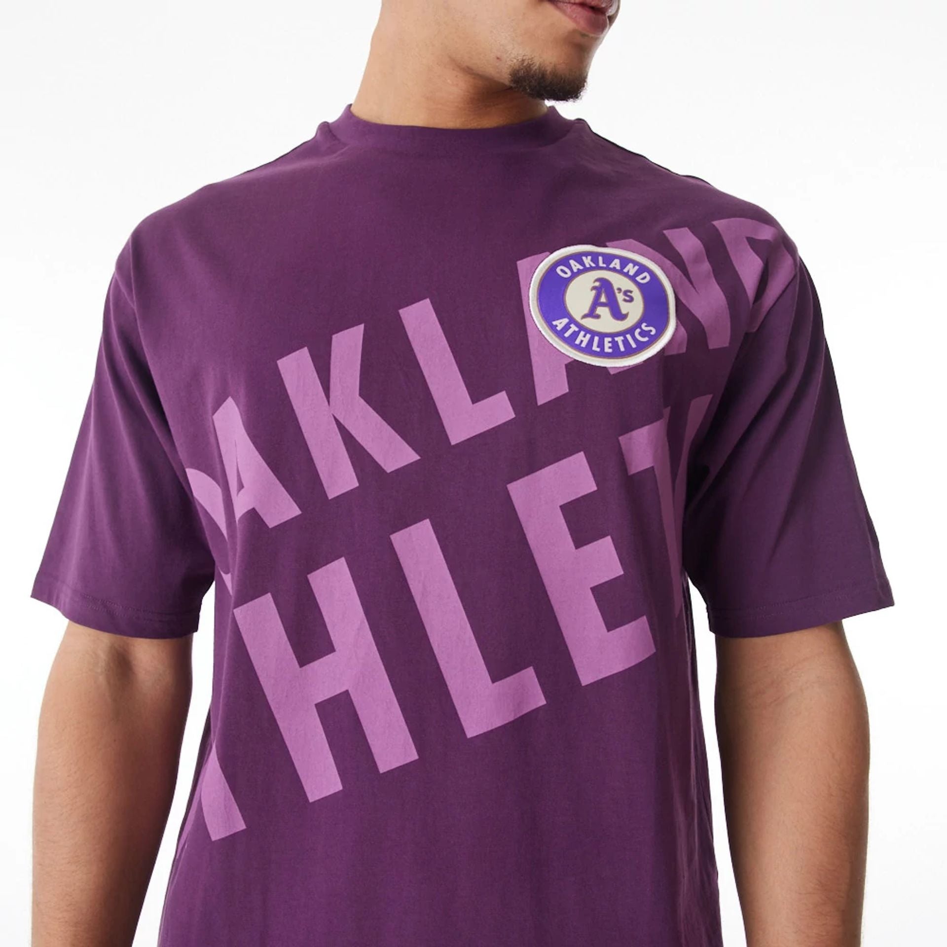 The Male model is wearing Oakland Athletics MLB Script Graphic Dark Purple Oversized T-Shirt  3