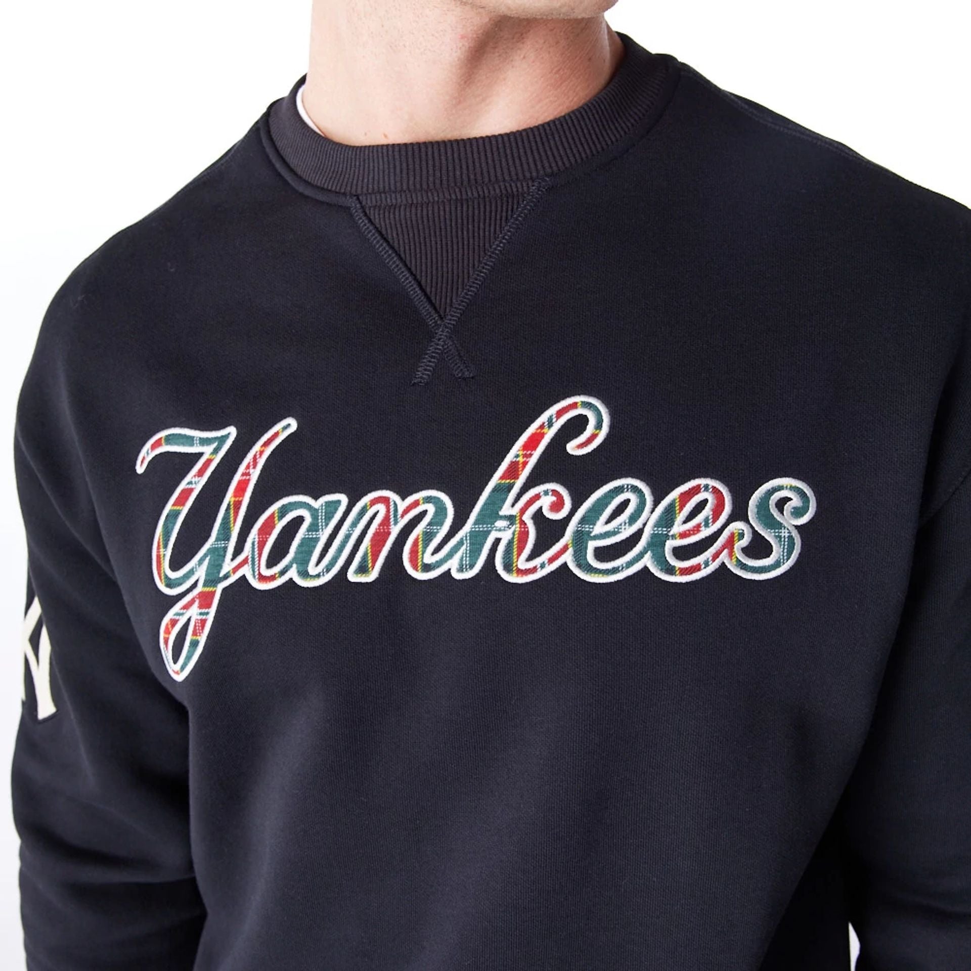 The Male model is wearing New York Yankees MLB Tartan Infill Black Crew Neck Sweater  10