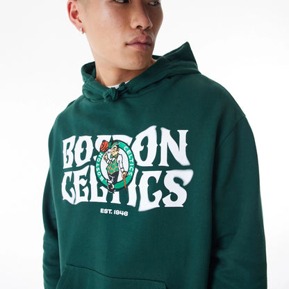 The Male model is wearing Boston Celtics NBA Graphic Dark Green Oversized Pullover Hoodie  9