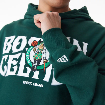 The Male model is wearing Boston Celtics NBA Graphic Dark Green Oversized Pullover Hoodie  6