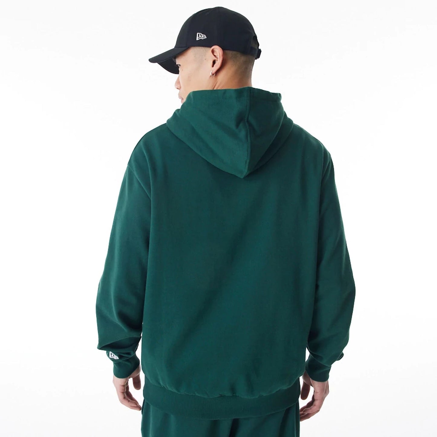 The Male model is wearing Boston Celtics NBA Graphic Dark Green Oversized Pullover Hoodie  2