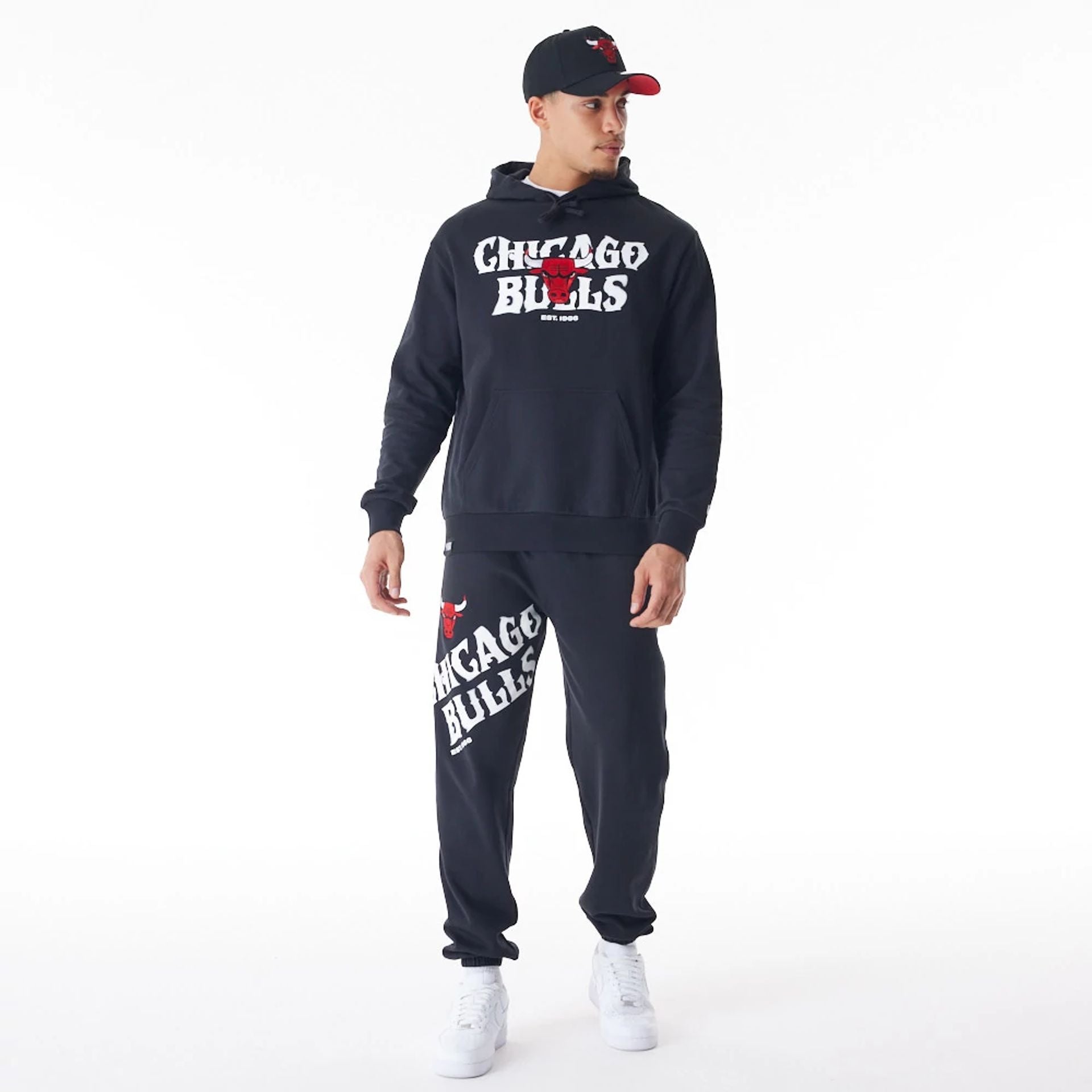 The Male model is wearing Chicago Bulls NBA Graphic Black Oversized Pullover Hoodie  4