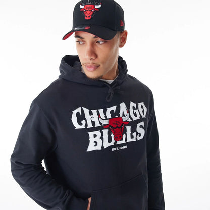 The Male model is wearing Chicago Bulls NBA Graphic Black Oversized Pullover Hoodie  7