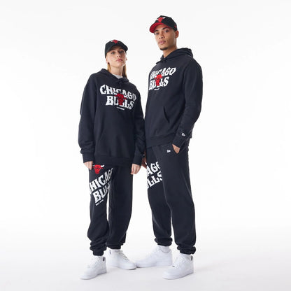 The Male model is wearing Chicago Bulls NBA Graphic Black Oversized Pullover Hoodie  9