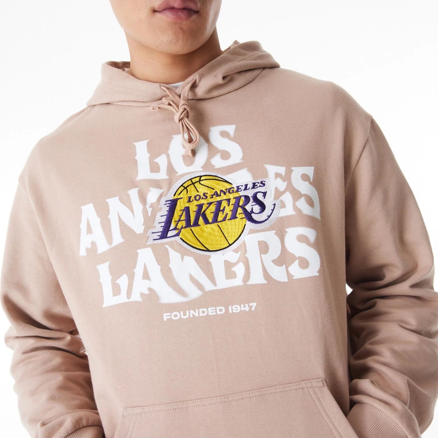 The Male model is wearing LA Lakers NBA Graphic Beige Oversized Pullover Hoodie  3