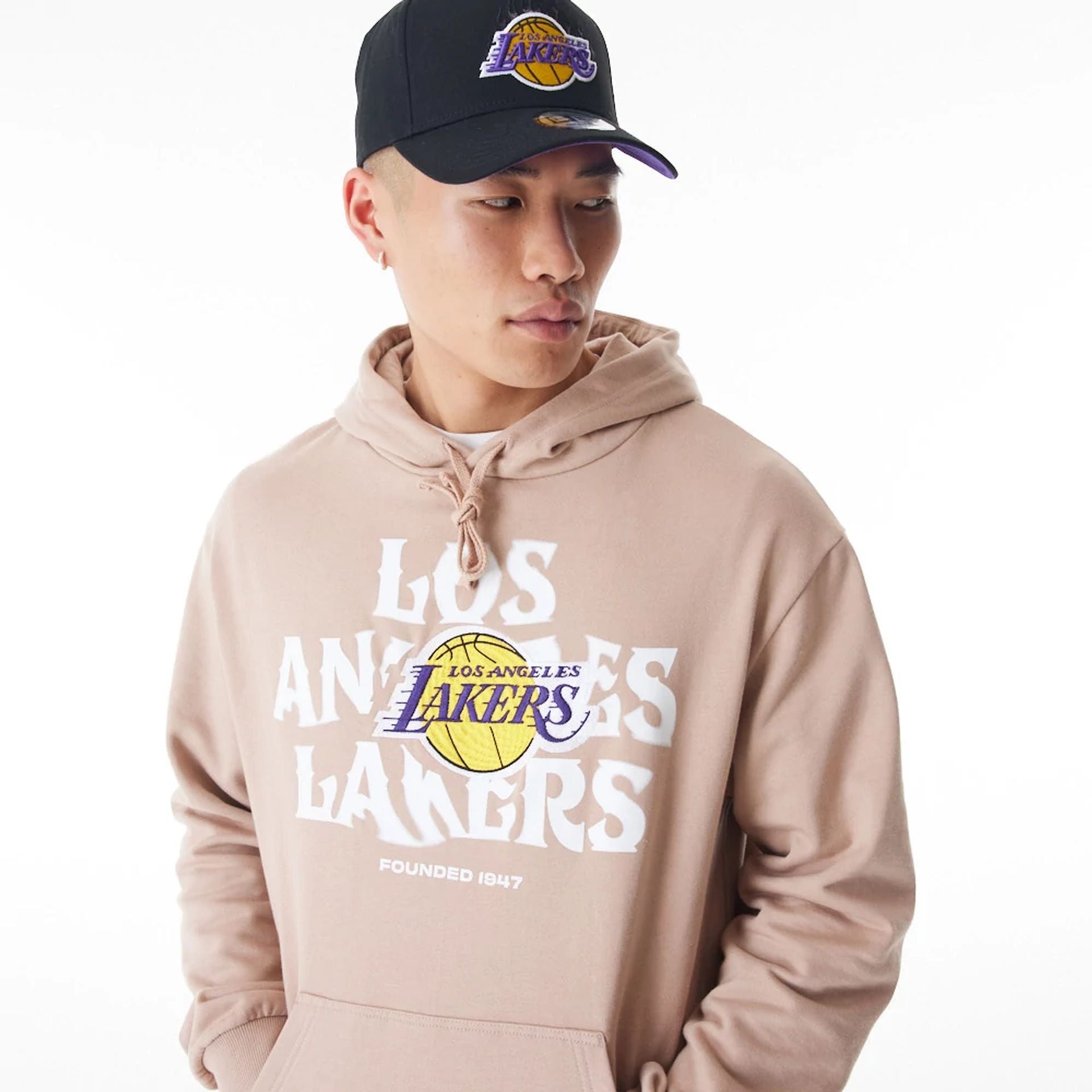 The Male model is wearing LA Lakers NBA Graphic Beige Oversized Pullover Hoodie  6