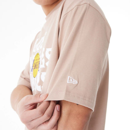 The Male model is wearing LA Lakers NBA Graphic Beige Oversized T-Shirt  4