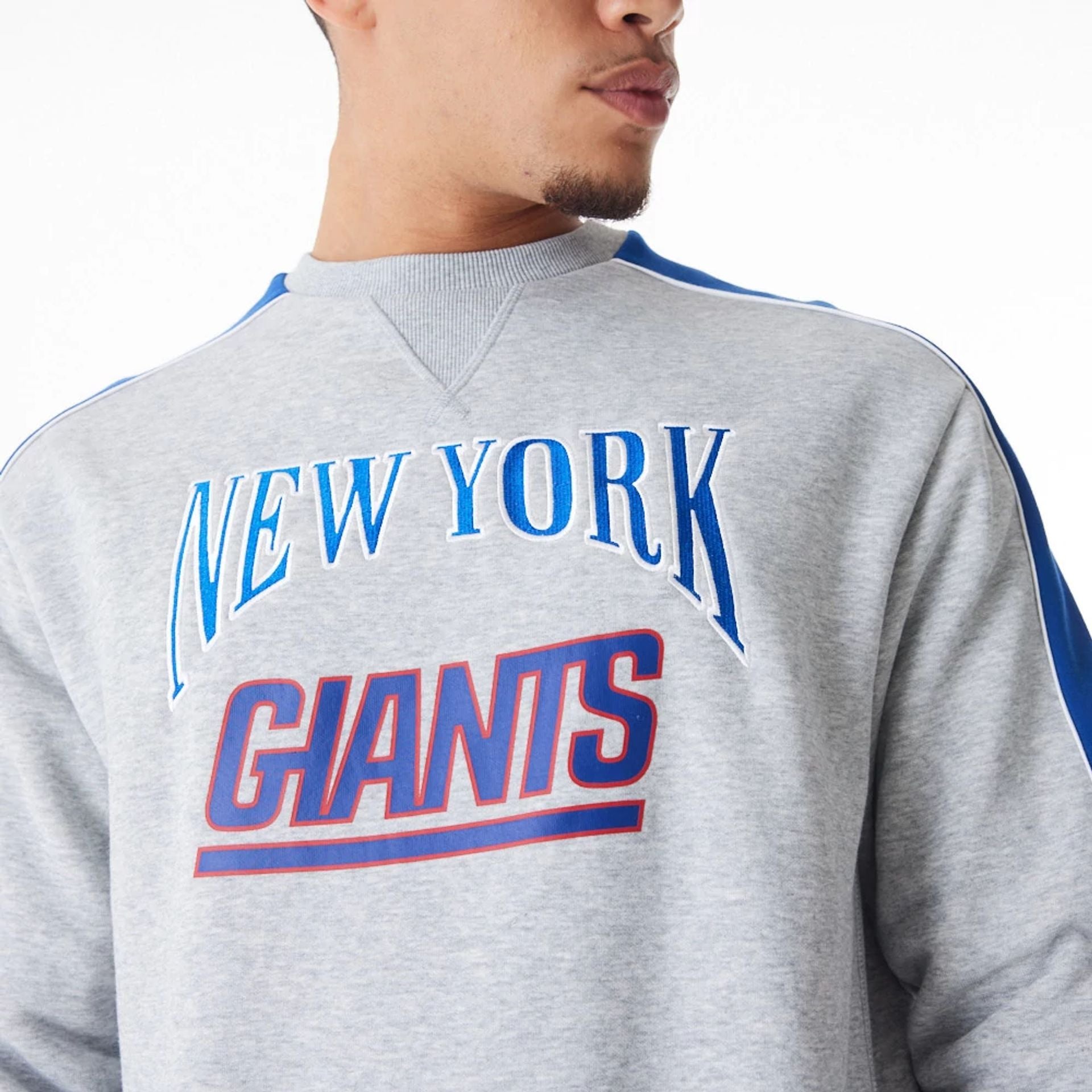 The Male model is wearing New York Giants NFL Graphic Grey Crew Neck Sweater  9