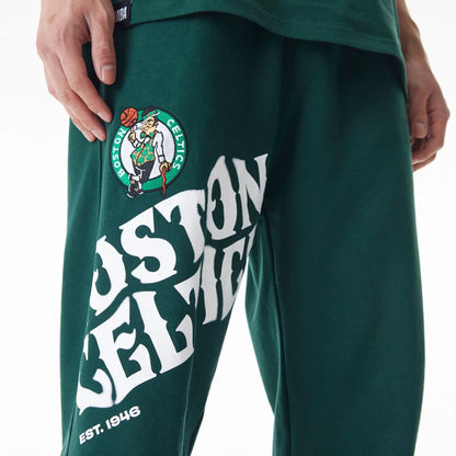 The Male model is wearing Boston Celtics NBA Graphic Dark Green Joggers  6