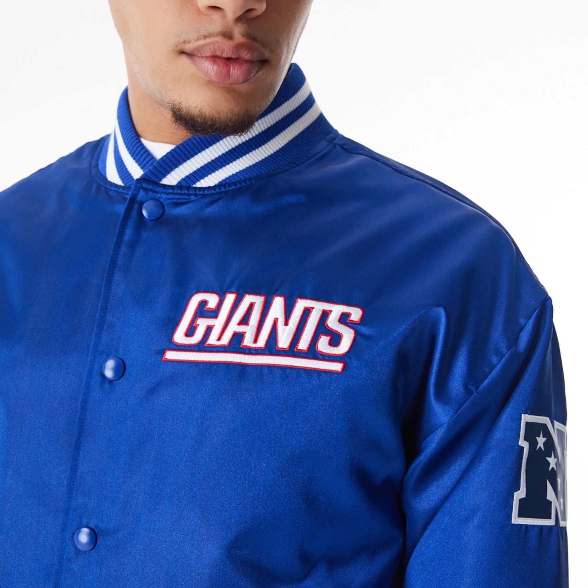 The Male model is wearing New York Giants NFL Blue Satin Bomber Jacket  6