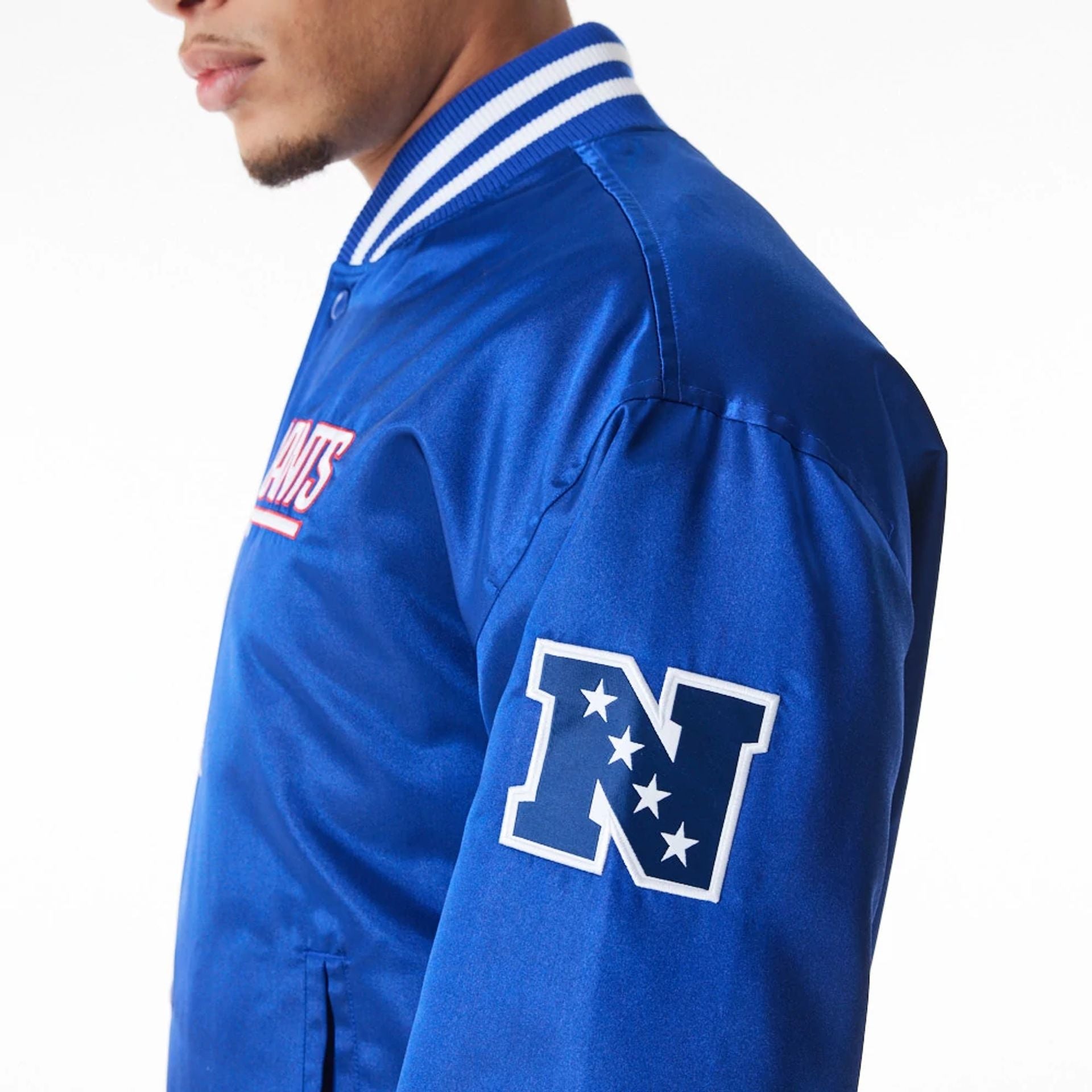 The Male model is wearing New York Giants NFL Blue Satin Bomber Jacket  7