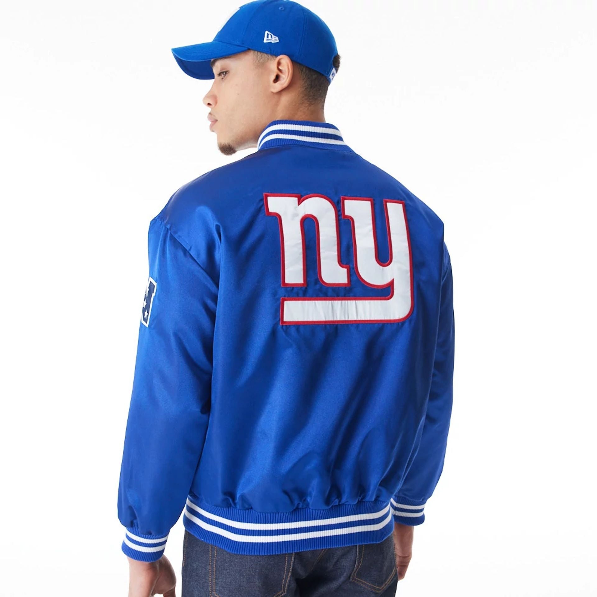 The Male model is wearing New York Giants NFL Blue Satin Bomber Jacket  9