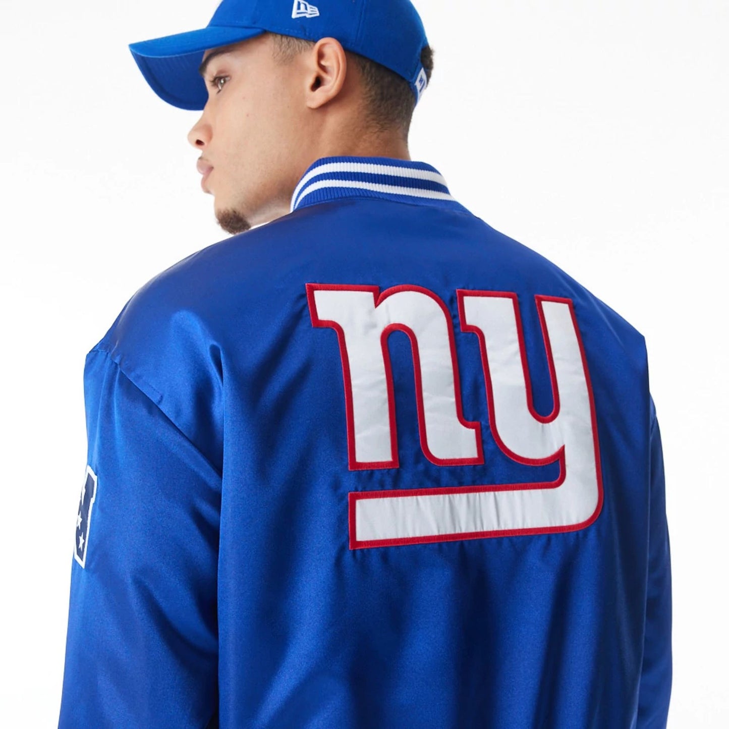 The Male model is wearing New York Giants NFL Blue Satin Bomber Jacket  4