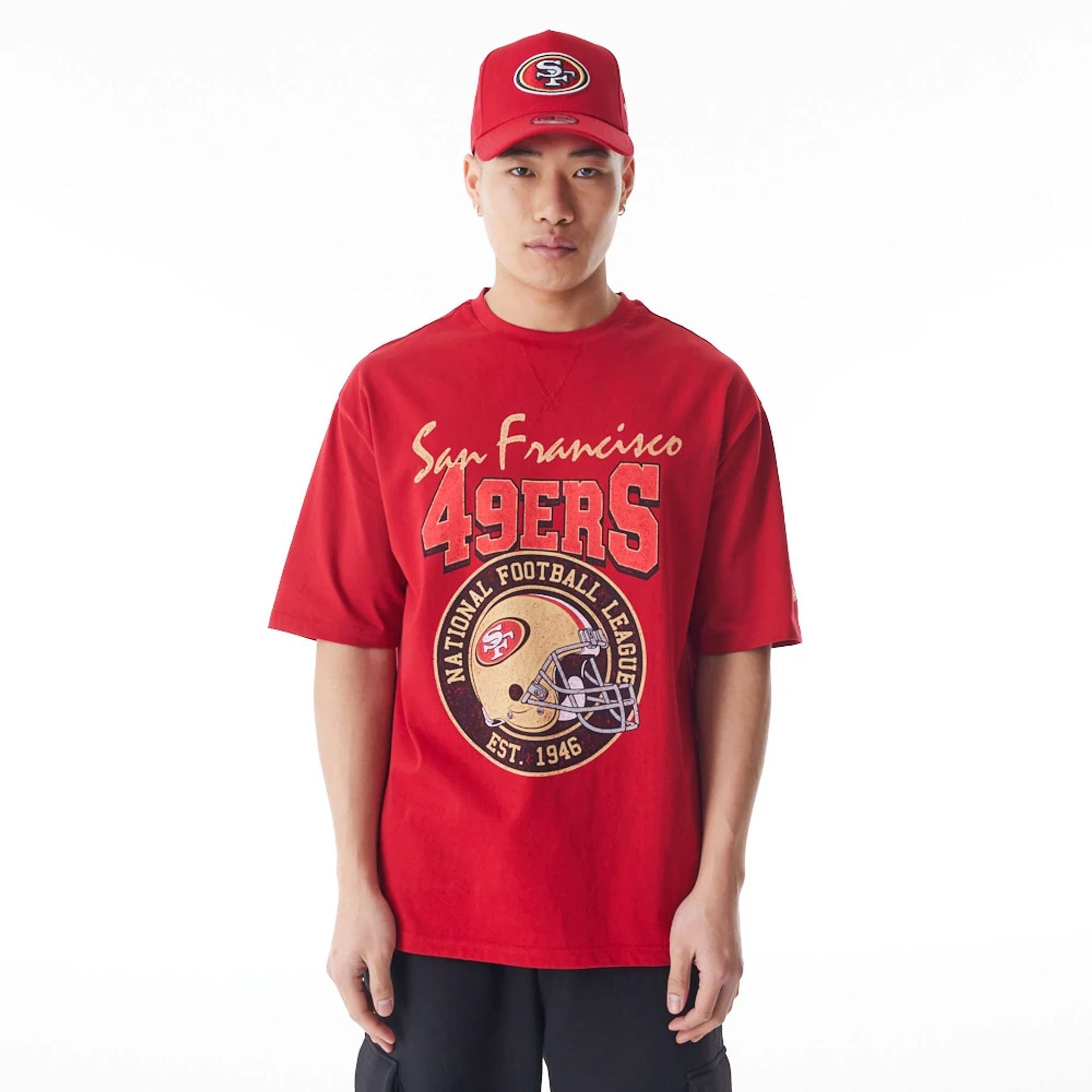 The Male model is wearing San Francisco 49ers NFL Helmet Graphic Red Oversized T-Shirt  1