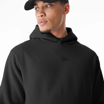 The Male model is wearing  New Era Flag Black Oversized Pullover Hoodie  5