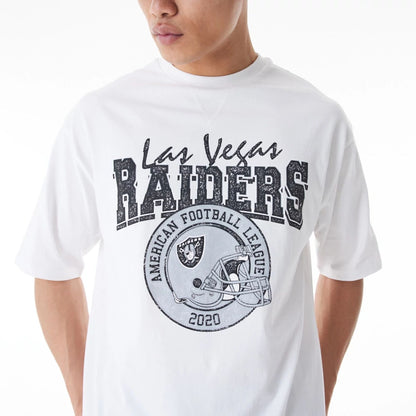 The Male model is wearing Las Vegas Raiders NFL Helmet Graphic White Oversized T-Shirt  4