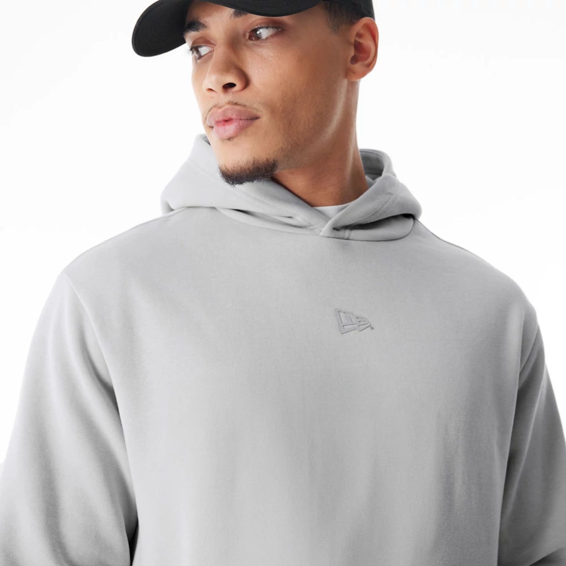 The Male model is wearing  New Era Flag Grey Oversized Pullover Hoodie  7