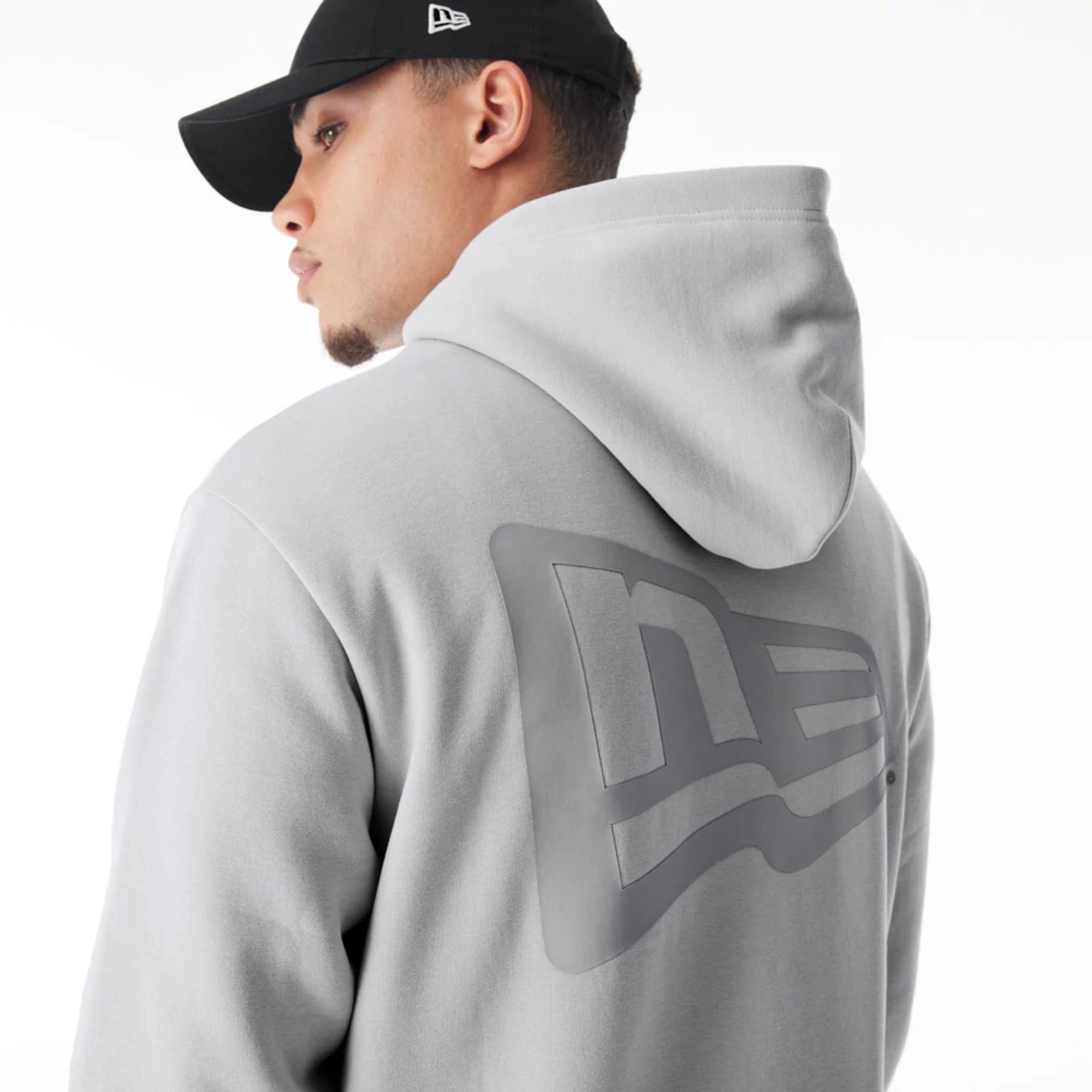 The Male model is wearing  New Era Flag Grey Oversized Pullover Hoodie  2