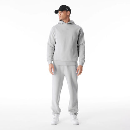 The Male model is wearing  New Era Flag Grey Oversized Pullover Hoodie  4