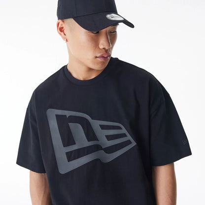 The Male model is wearing  New Era Flag Black Oversized T-Shirt  4